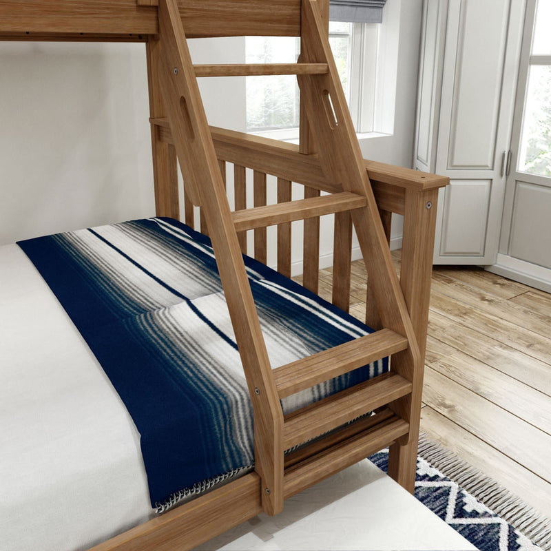 Wooden bunk bed with ladder and blue-striped bedding in a cozy bedroom setting.