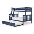 Navy blue wooden bunk bed with built-in staircase, safety rails and pull-out trundle mattress, space-saving kids loft bed on white background