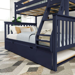 Navy blue wooden bunk bed with pull-out trundle bed and cozy bedding in a modern bedroom.