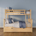 Wooden twin-over-twin bunk bed with blue and gray quilted bedding, ladder and under-bed drawers against a light blue wall