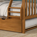 Solid oak bunk bed ladder and slatted frame with natural wood finish, white textured bedding and under-bed storage drawer