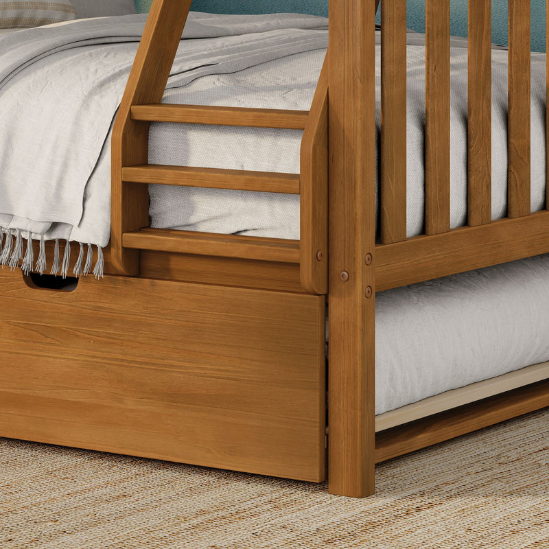 Solid oak bunk bed ladder and slatted frame with natural wood finish, white textured bedding and under-bed storage drawer