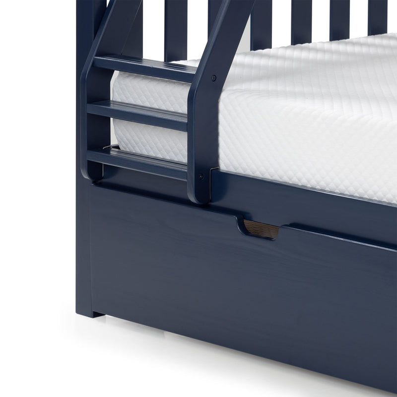 Navy blue wooden bunk bed close-up showing ladder steps, white quilted mattress and built-in under-bed storage drawer