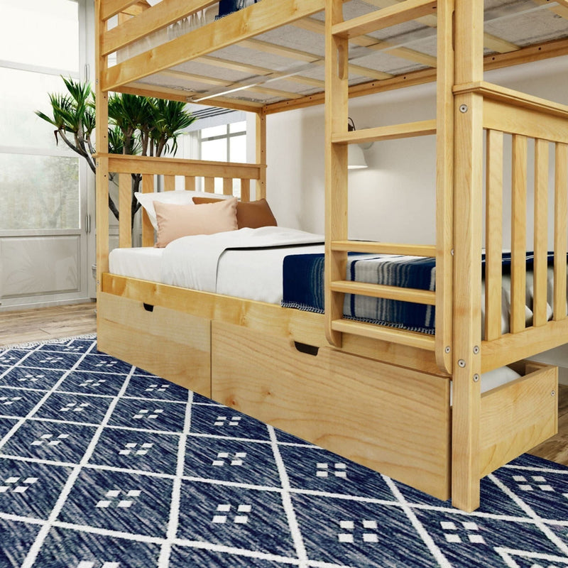 Wooden bunk bed with ladder and under-bed storage drawers in a modern bedroom with blue patterned rug.