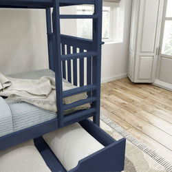 Blue wooden bunk bed with storage drawer and bedding in a modern bedroom.