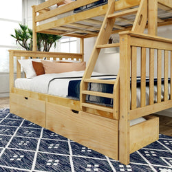 Wooden bunk bed with drawers in a bright bedroom, featuring a stylish navy patterned rug.