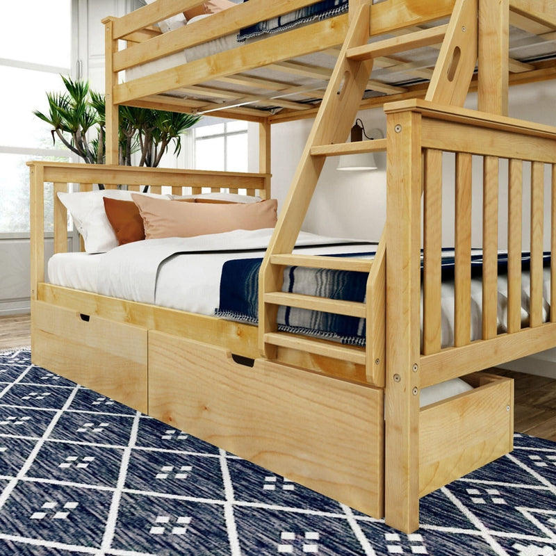 Wooden bunk bed with drawers in a bright bedroom, featuring a stylish navy patterned rug.