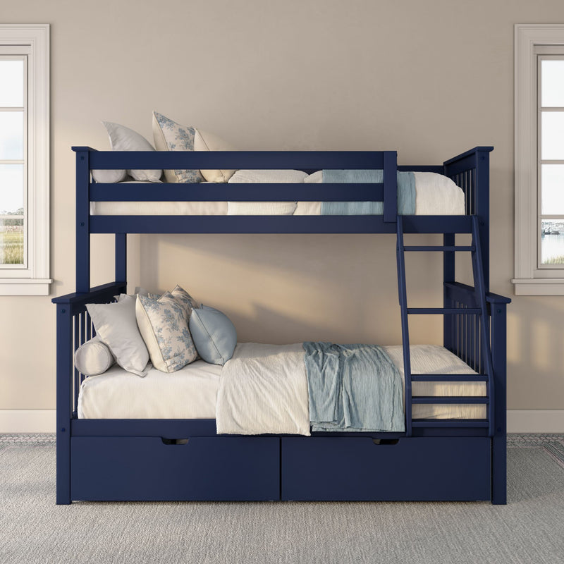 Navy blue wooden twin-over-full bunk bed with ladder, under-bed storage drawers and light blue floral pillows in styled kids' bedroom