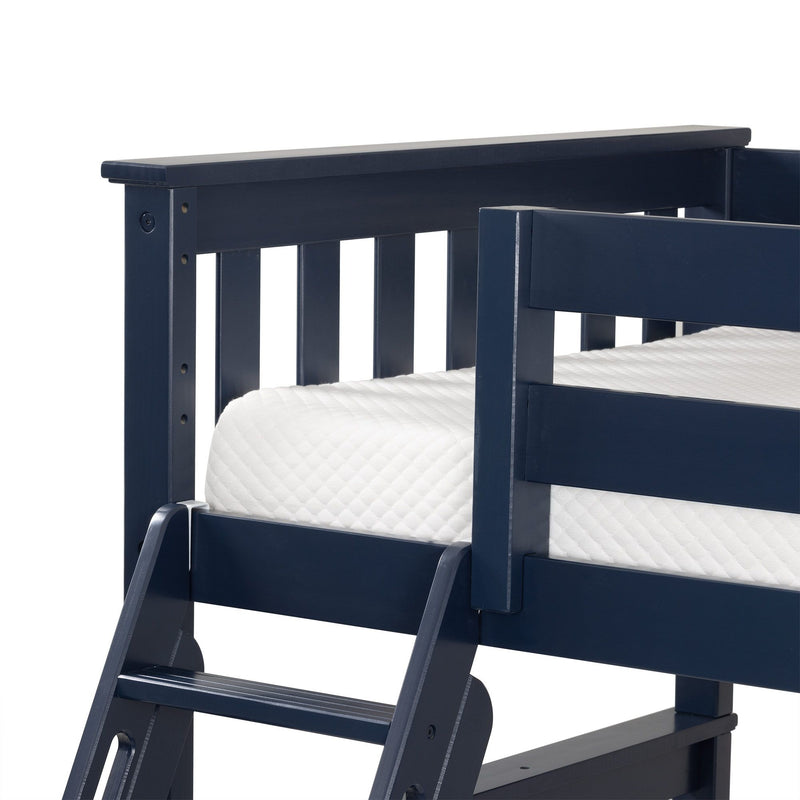 Close-up of navy blue wooden bunk bed frame with ladder and guardrail holding a white twin mattress, modern kids bedroom furniture
