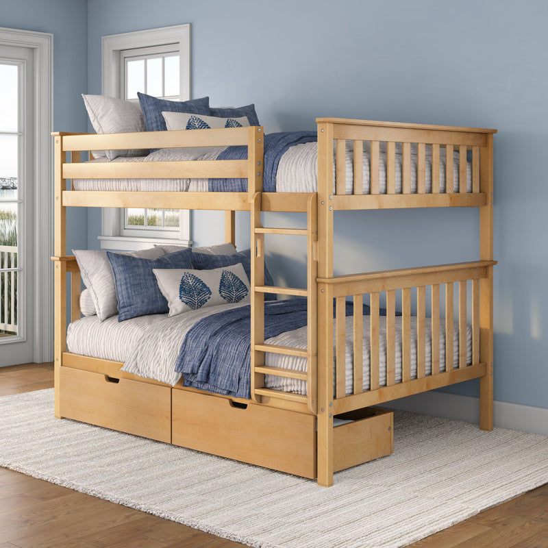 Solid wood bunk bed with blue quilted bedding and under-bed storage drawers in a bright coastal kids' bedroom