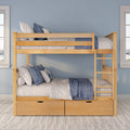 Solid wood kids bunk bed with ladder and under-bed storage drawers, styled with blue and white linens against a light blue wall