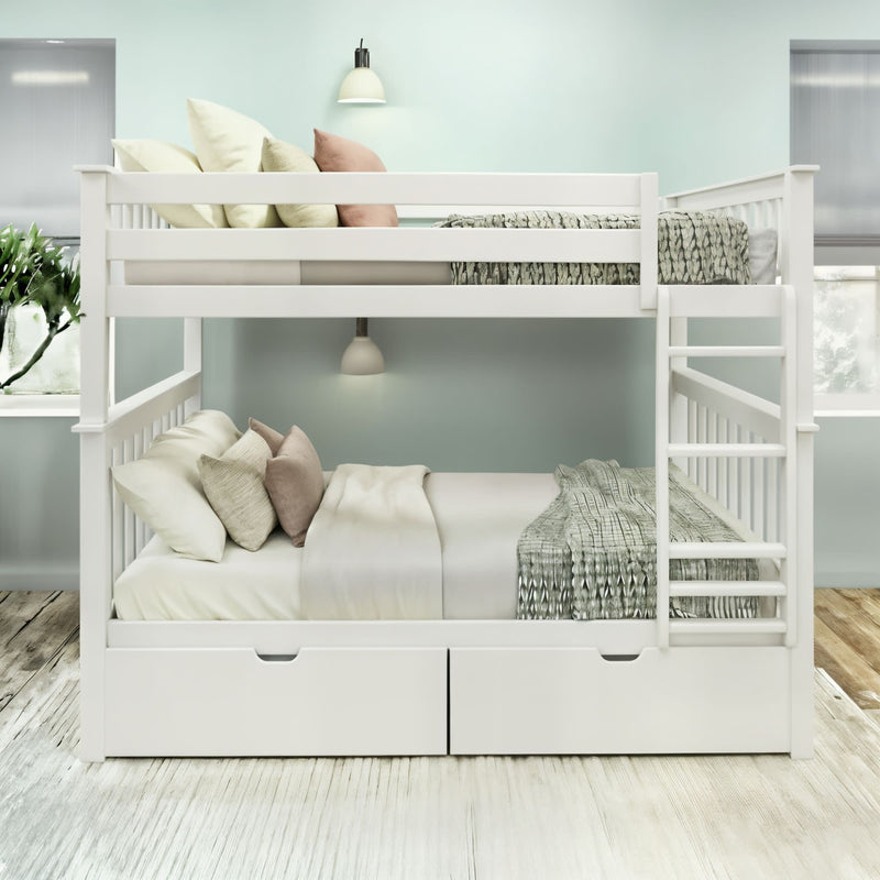 White wooden bunk bed with ladder and built-in storage drawers, styled with neutral pillows and knit throws in a modern mint-green kids' bedroom on light wood floors