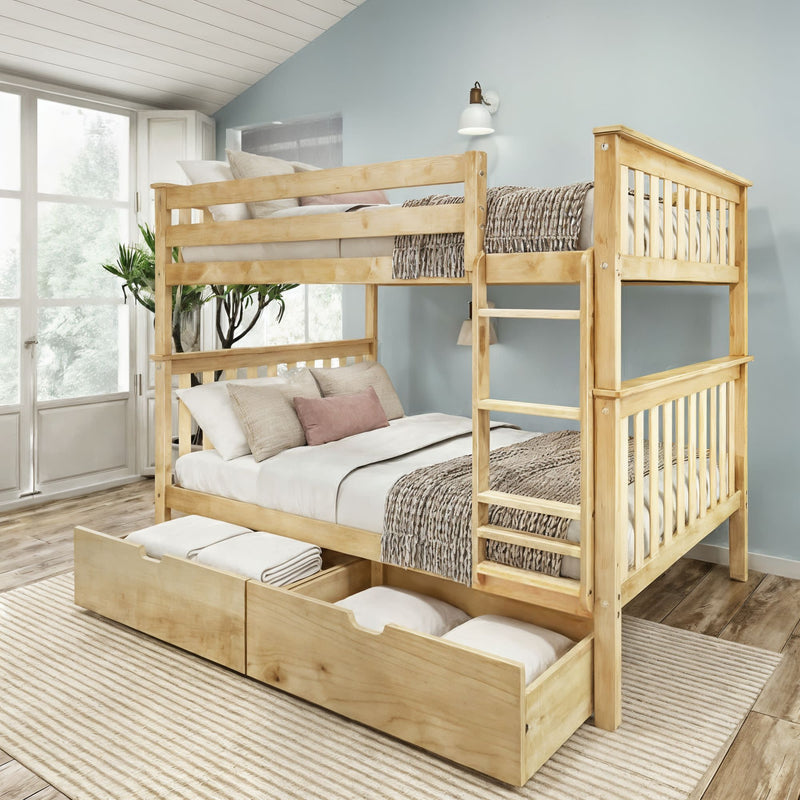 Solid natural pine twin-over-full bunk bed with built-in ladder, slatted rails and two under-bed storage drawers, styled with neutral bedding in a light-blue modern farmhouse bedroom with wood floors and large windows