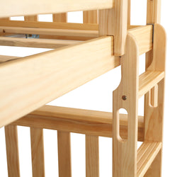 Wooden bunk bed ladder close-up showing natural pine finish.