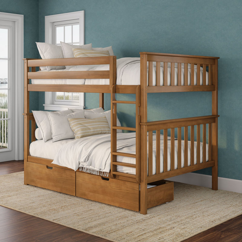 Twin-over-full solid wood bunk bed with built-in under-bed storage drawers and ladder, dressed in white linens and striped accent pillows against a teal wall by bright windows in a coastal-inspired bedroom