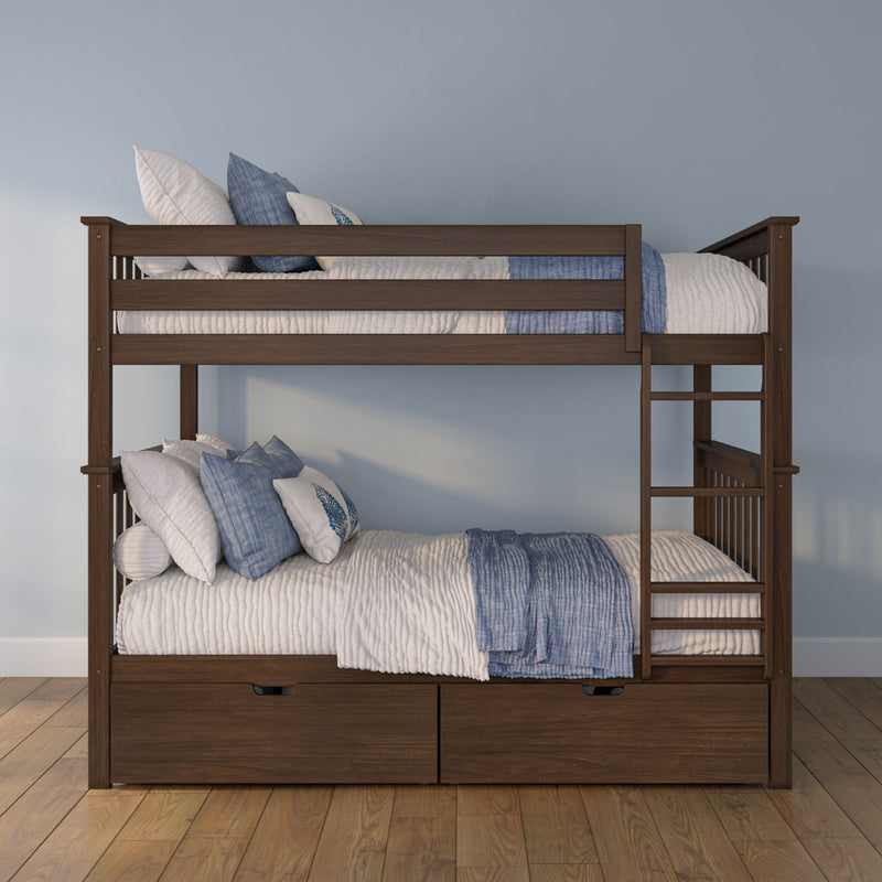 Solid dark wood bunk bed with ladder and built‑in under‑bed storage drawers, styled with blue and white quilted bedding and pillows against a light blue bedroom wall
