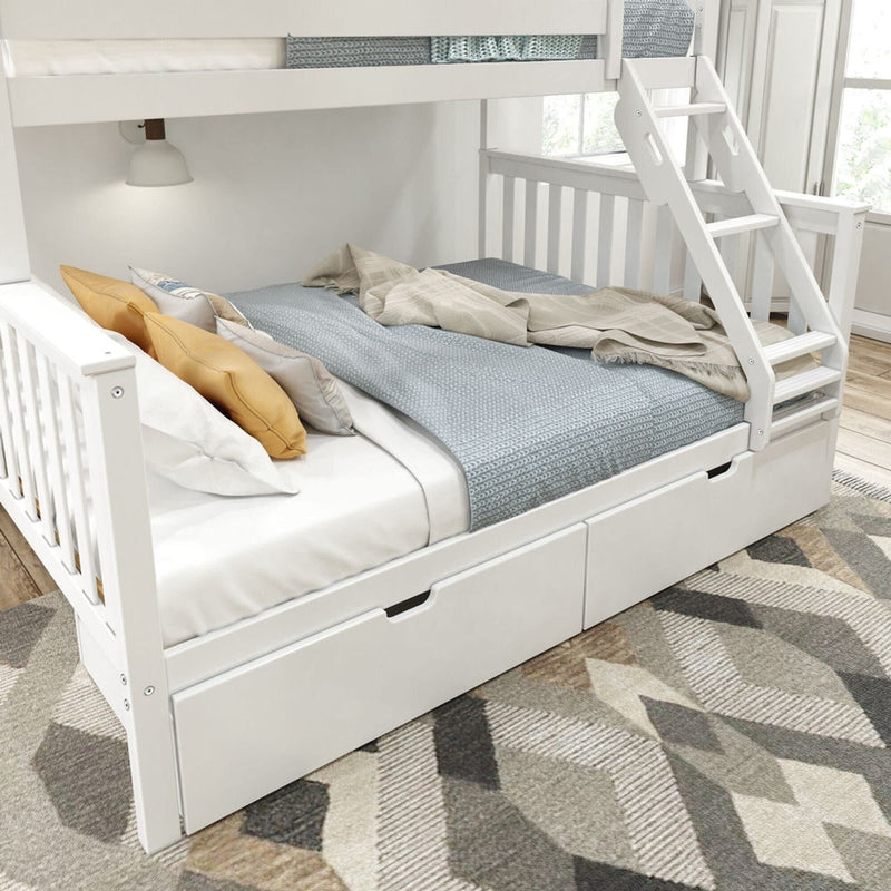 White wooden bunk bed with storage drawers, cozy blue and beige bedding, geometric rug, and a reading lamp in a bright bedroom setting.