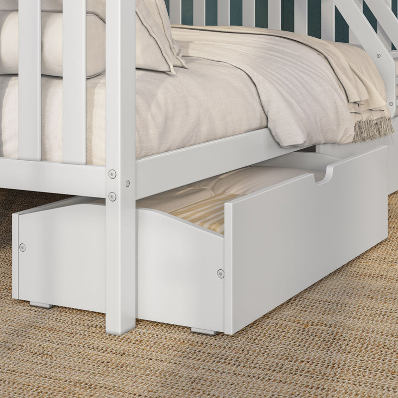 White wooden bunk bed with pull-out trundle and storage drawer, neutral beige bedding and woven jute rug