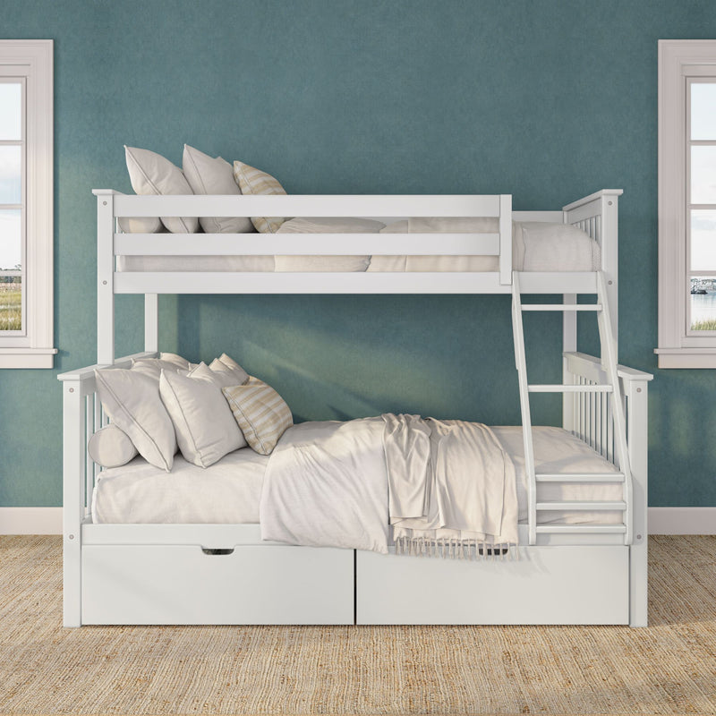 White wooden bunk bed with ladder and under-bed storage drawers, beige bedding and pillows against a teal wall in a bright kids' bedroom