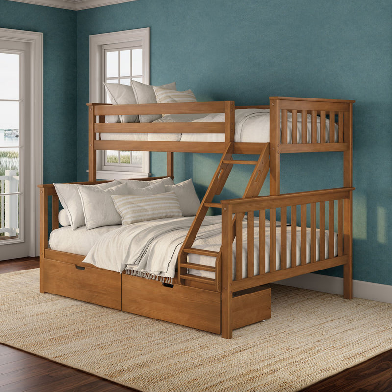 Solid wood twin-over-full bunk bed with ladder and under-bed storage drawers in a coastal teal bedroom with neutral linens and pillows