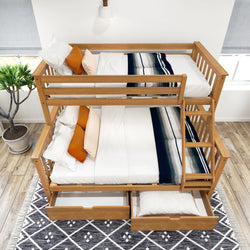 Wooden bunk bed with storage drawers, colorful striped bedding, and orange throw pillows in a modern bedroom setting.