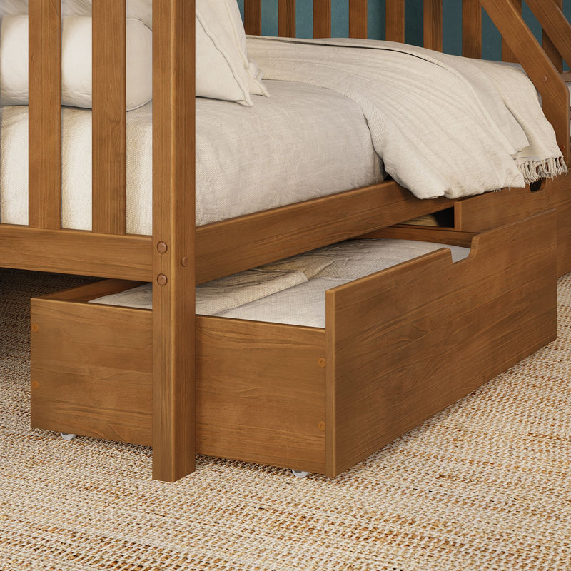 Solid oak bunk bed with pull-out trundle on casters, beige linen bedding, slatted guard rails and natural wood finish