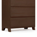 Dark wood three-drawer dresser with modern design and angled legs.