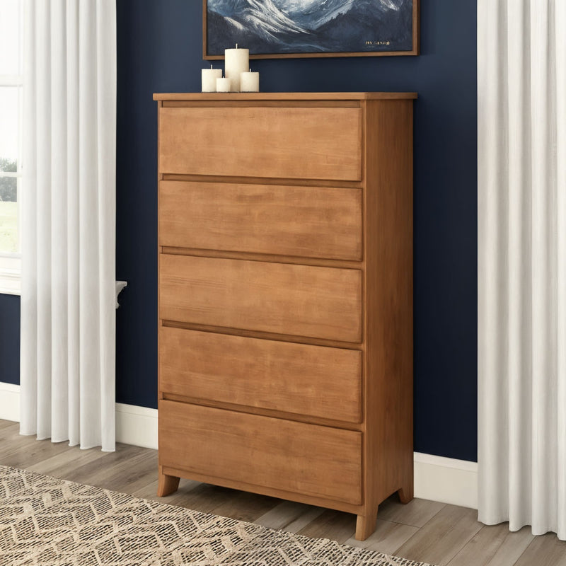 Tall 5-drawer wooden dresser in natural oak finish for bedroom storage, modern farmhouse chest of drawers against a navy accent wall with white curtains, decorative candles and patterned area rug