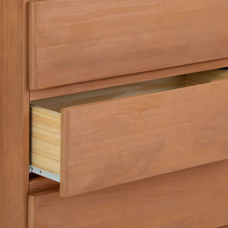 Open wooden dresser drawer displaying smooth finish and craftsmanship.