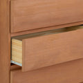 Open wooden dresser drawer displaying smooth finish and craftsmanship.
