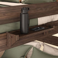 Wooden bunk bed shelf with a black water bottle and smartphone, highlighting bedroom storage solutions.