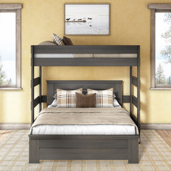 Gray wooden full-over-twin bunk bed in modern farmhouse bedroom with beige bedding and plaid pillows, yellow textured walls, framed coastal artwork and two windows with natural light