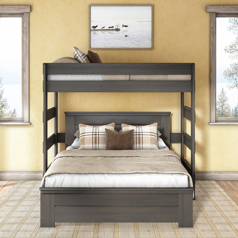Gray wooden full-over-twin bunk bed in modern farmhouse bedroom with beige bedding and plaid pillows, yellow textured walls, framed coastal artwork and two windows with natural light