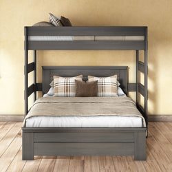 Gray solid-wood bunk bed with full-size lower bed and twin top bunk, neutral beige bedding and plaid accent pillows on wooden floor against a warm yellow wall