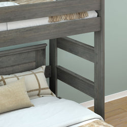 Gray wooden bunk bed with light bedding and pillows, modern bedroom furniture.