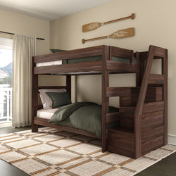 Dark walnut wooden bunk bed with built-in staircase storage and green bedding in cozy bedroom with mountain view and oar wall decor