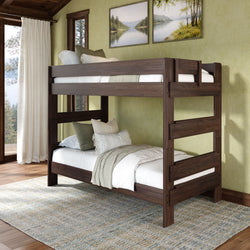 Dark walnut solid wood twin-over-twin bunk bed with white bedding and green accent pillows in a modern rustic bedroom