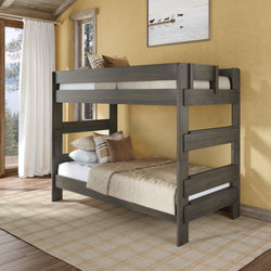 Gray solid wood bunk bed in a cozy modern farmhouse bedroom with neutral bedding, decorative pillows, built-in ladder and large window view