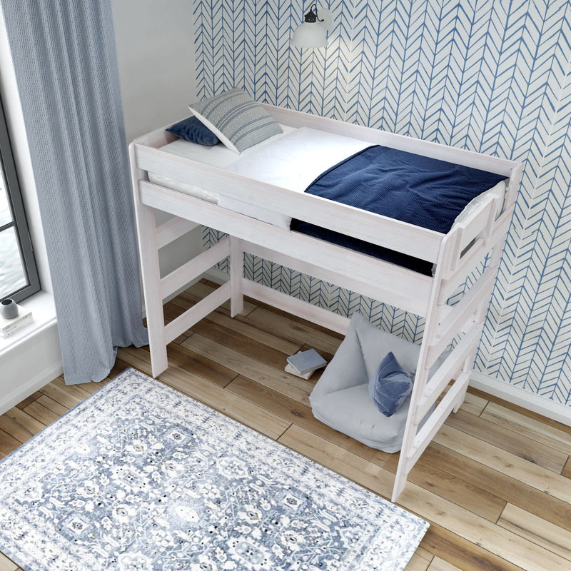 White wooden loft bed for kids with modern bedding and blue patterned rug in a cozy bedroom.