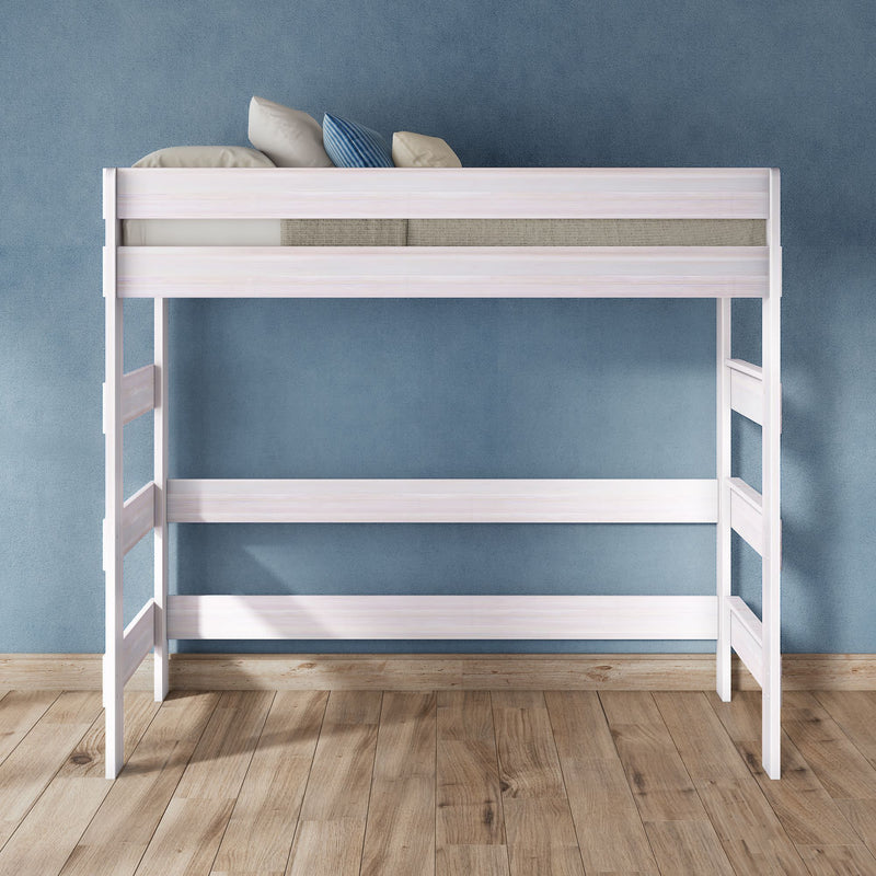 White wooden loft bed with ladder and guardrails, modern space-saving raised bed frame with pillows against a blue textured wall on hardwood floor