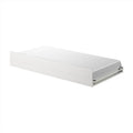 White wooden single trundle bed with pull-out underbed storage and fitted mattress, minimalist low-profile platform bed for small bedrooms