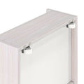 Close-up of whitewashed wood sliding barn door top track with metal brackets and white nylon roller — modern sliding door roller hardware interior track detail
