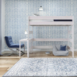 Minimalist bedroom with loft bed, blue chair, and patterned wallpaper.