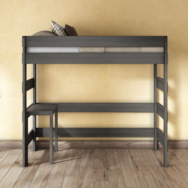 Space-saving modern dark wood loft bed with built-in desk and ladder, twin mattress and pillows against yellow wall on hardwood floor