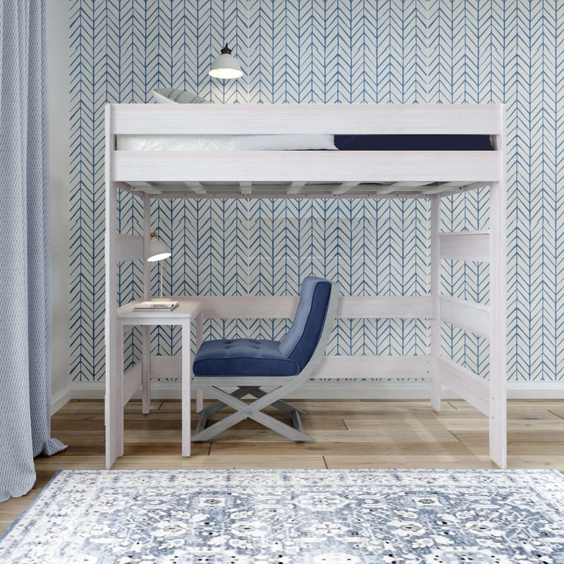 Loft bed with a study desk underneath, featuring a blue chair and modern lighting against a patterned backdrop.