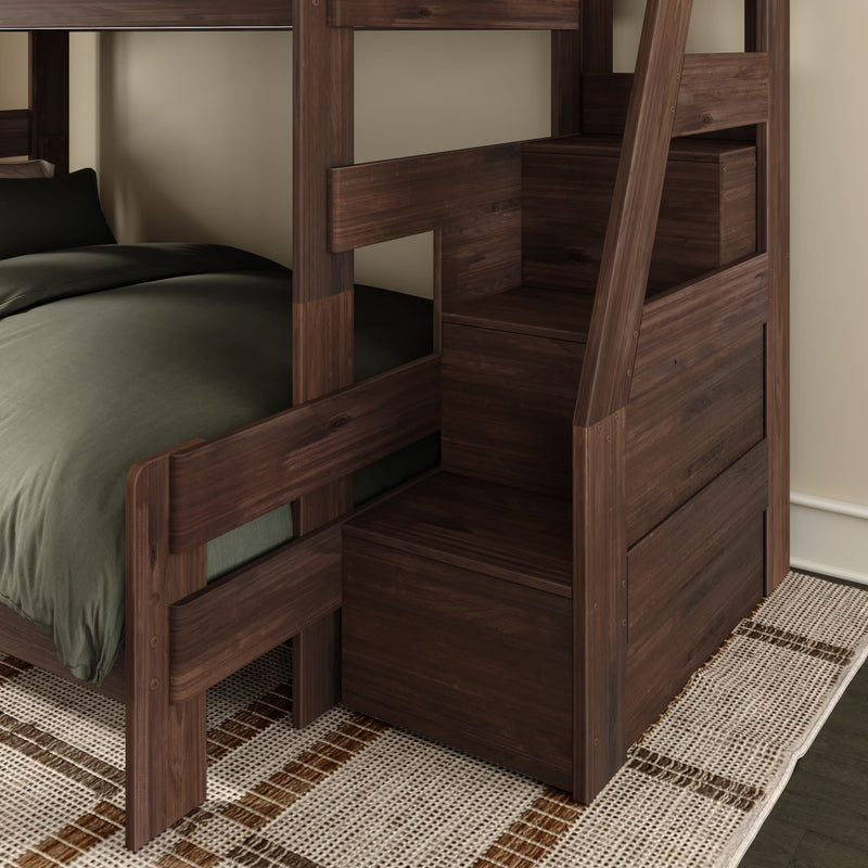 Dark walnut wooden bunk bed with integrated staircase and built-in storage drawers, space-saving modern kids bedroom furniture with green bedding and woven area rug