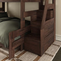 Dark walnut wooden bunk bed with built-in staircase storage, green bedding and woven area rug, space-saving modern rustic bedroom furniture