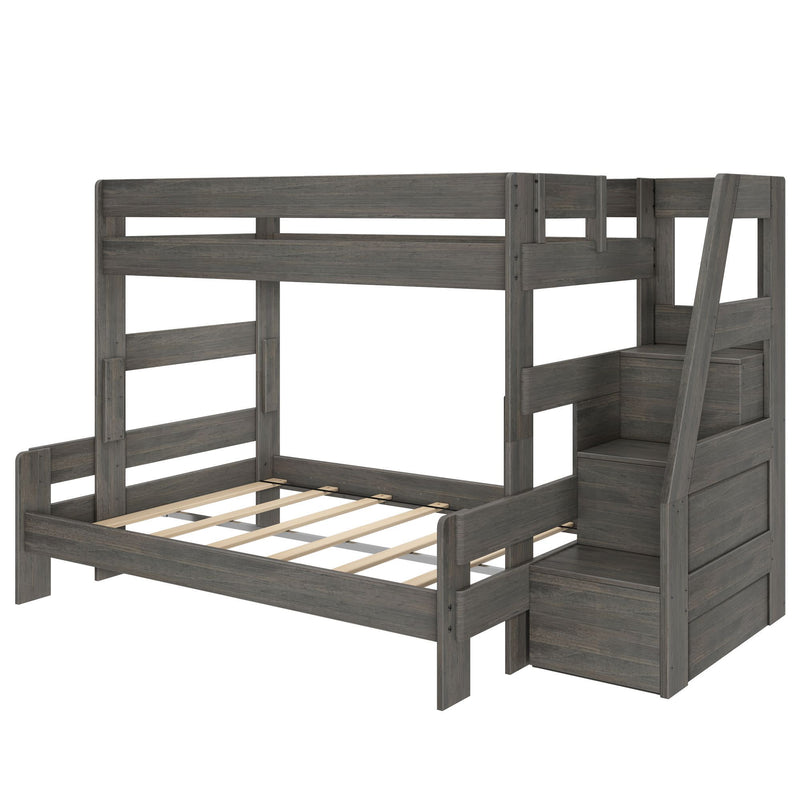 Gray wood twin-over-full bunk bed with built-in storage staircase, slatted platform lower bed frame and guardrails for kids' bedroom