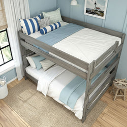 Gray weathered wooden bunk bed with blue-and-white striped pillows and light blue bedding in a coastal-style, space-saving bedroom