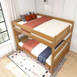 Wooden bunk bed with comfortable bedding and decorative pillows in a bright, cozy bedroom.